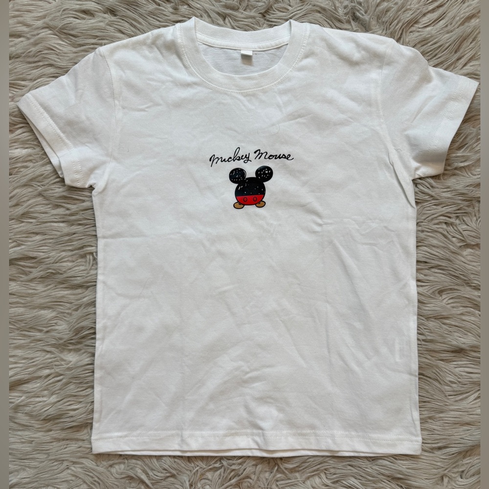 New without tags size 150 (kids 10 - 12) Mickey Mouse shirt.  Unisex.